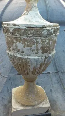 stone urn after paint removal with chemical stripper