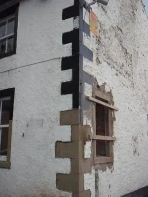 stone corners after paint removal with sand jet