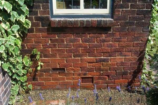 dirty bricks after sand jet cleaning