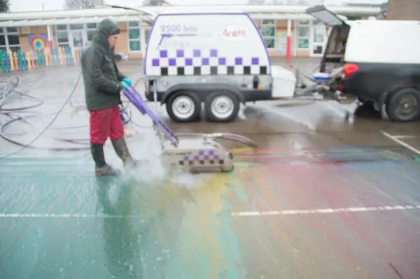 play020 - Greenleaf Contractors | Sandblasting And Pressure Washing | UK playground thermoplastic during removal with Ultra High Pressure Water