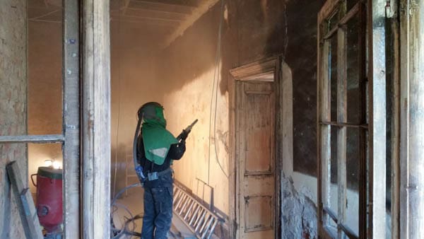 Unlocking the Power of Sand Blasting: How Professionals Tackle Paint, Rust, and Graffiti